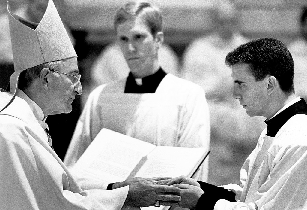 TOWARD PRIESTHOOD—Bishop Anthony F. Mestice conferred the order of acolyte on the future Father Thomas A. Lynch, then a seminarian, at St. Joseph’s Seminary, Dunwoodie. Bishop Mestice fostered vocations throughout his priesthood.