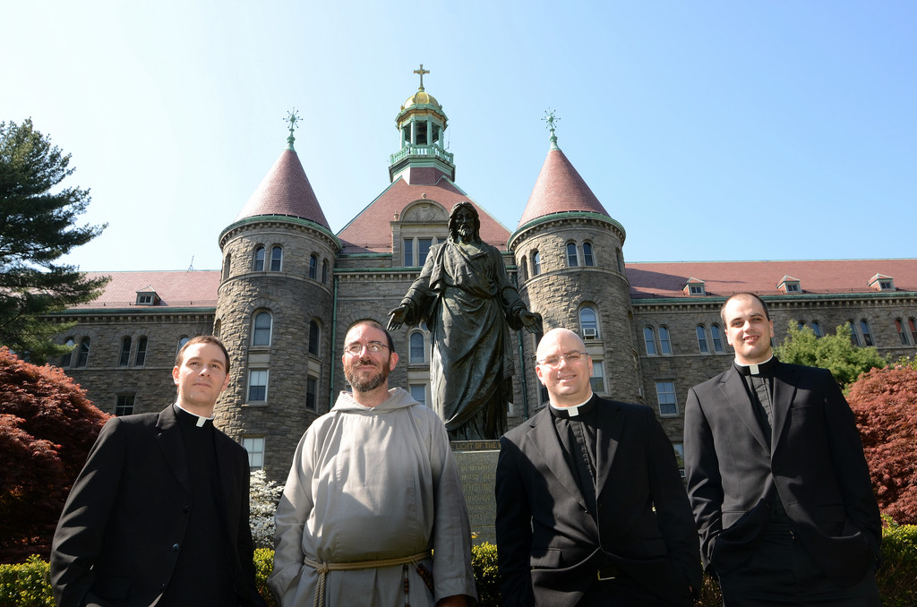 GRADUATES—At St. Joseph’s Seminary, Dunwoodie, are Fathers Patrick D’Arcy, John Paul Ouellette, C.F.R., Chad Grennan and Ben Weber.