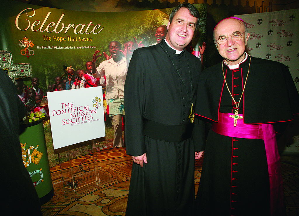 MISSION CALL—Archbishop Carlo Maria Vigano, apostolic nuncio to the United States, right, was among the notable guests at the first World Mission Dinner. Father Andrew Small, O.M.I., national director of the Pontifical Mission Societies and host of the evening, welcomes the archbishop.