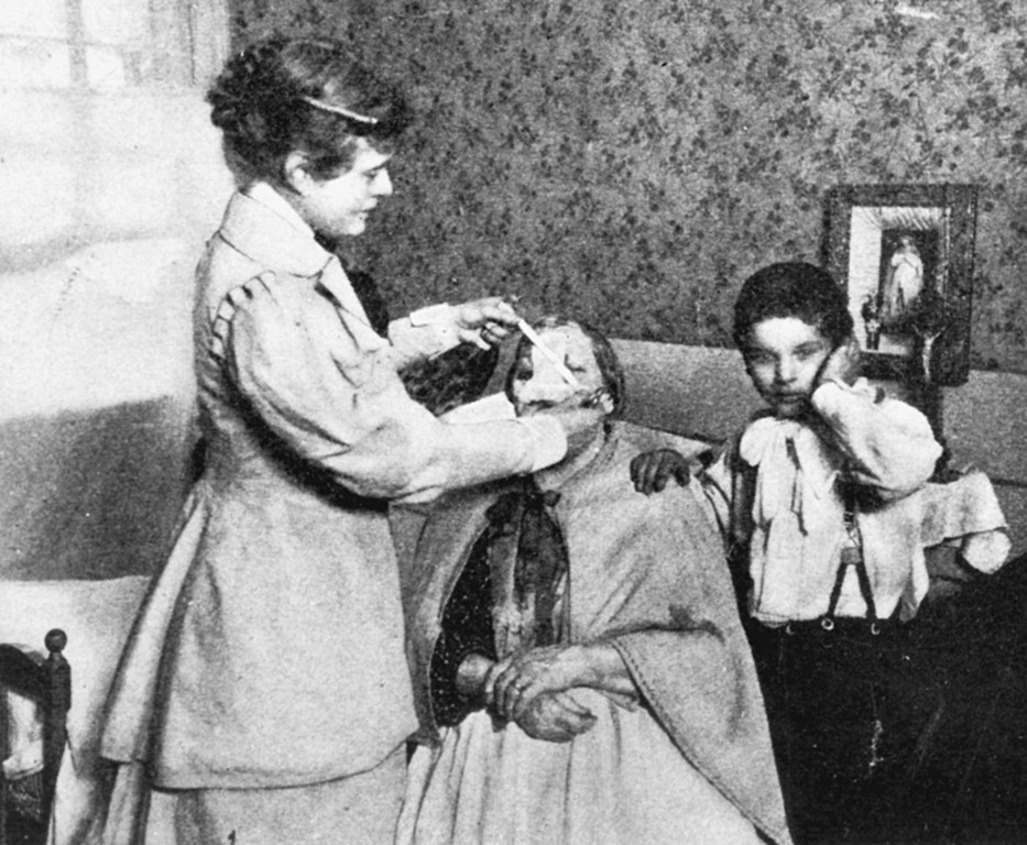 Rose Hawthorne Lathrop, who was known in religion as Mother Alphonsa, tends to a sick woman in the tenement hospice she started in the late 1890s while still a lay Catholic woman.