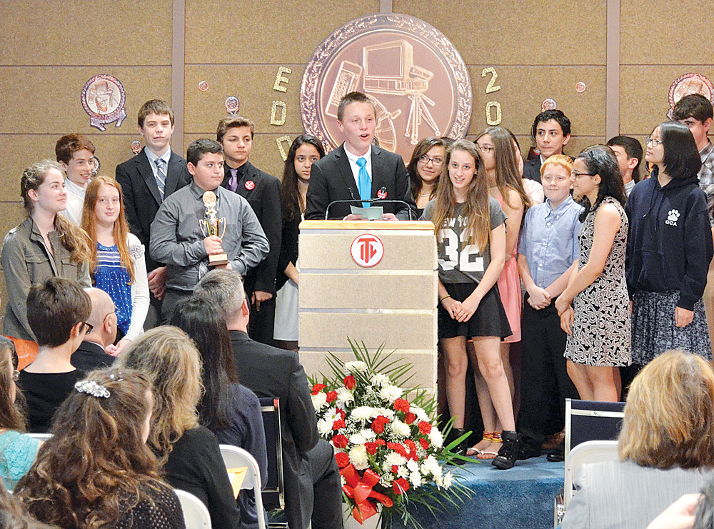 Members of the winning elementary school news team from Transfiguration in Tarrytown pick up their awards and receive a rousing round of applause at the Eddy Awards ceremony at ITV studios on the campus of St. Joseph’s Seminary in Dunwoodie May 16.