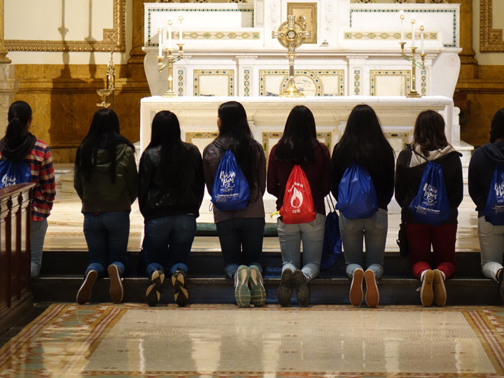 Youths pray before the Blessed Sacrament in the chapel at St. Joseph’s Seminary, Dunwoodie.