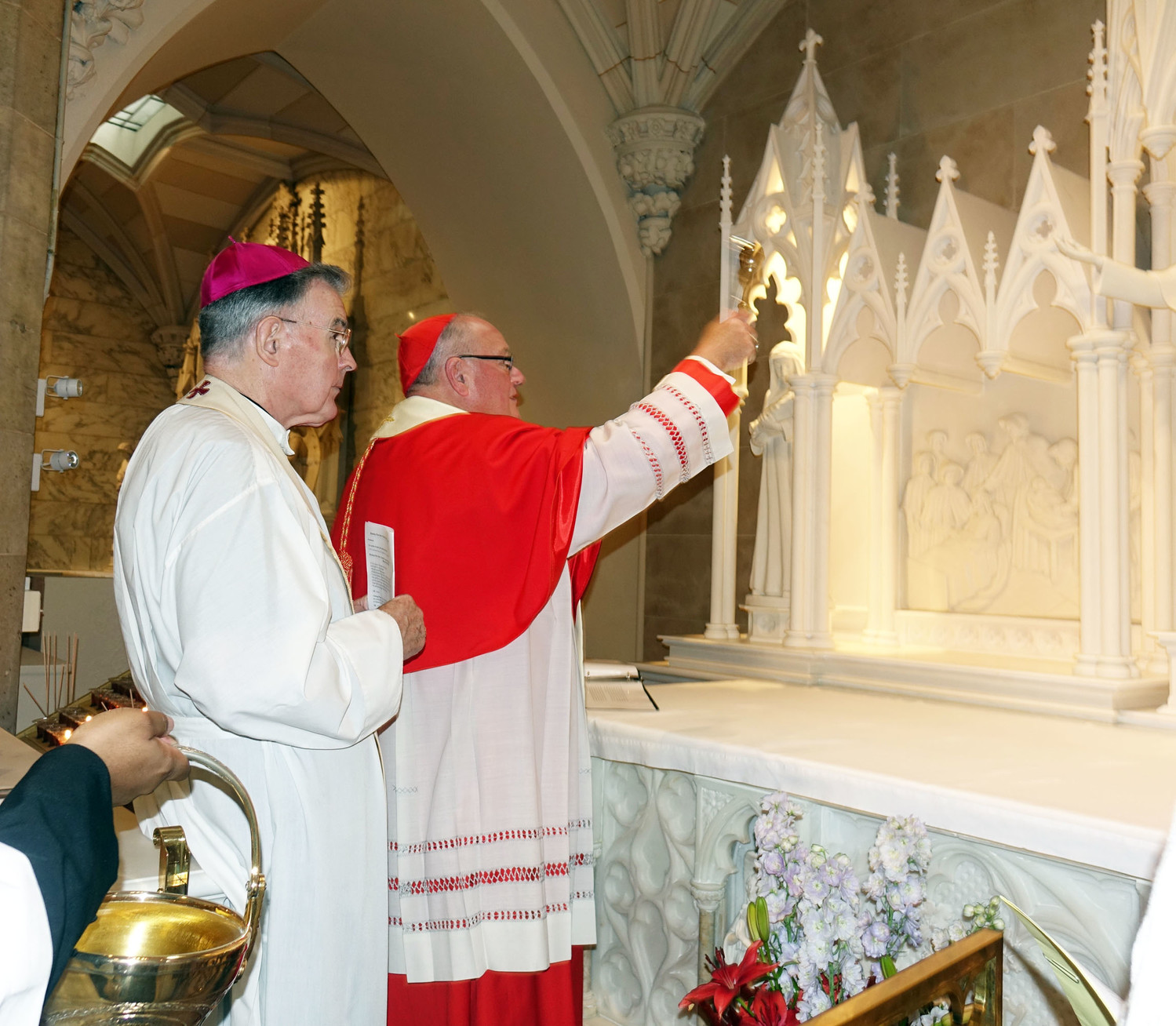 Cardinal Dolan blesses the new Shrine of St. Elizabeth Ann Bayley Seton at an afternoon prayer service at St. Patrick’s Cathedral Oct. 8. Behind him is Auxiliary Bishop Gerald Walsh.
