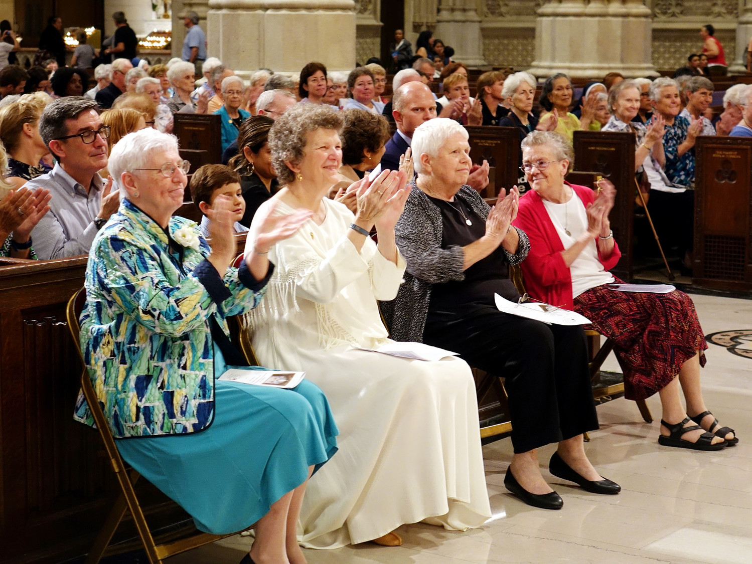 Several Sisters of Charity of New York applaud. The new Shrine of St. Elizabeth Ann Seton is the beneficiary of community support under the leadership of Sister Jane Iannucelli, S.C., president of the Sisters of Charity of New York.