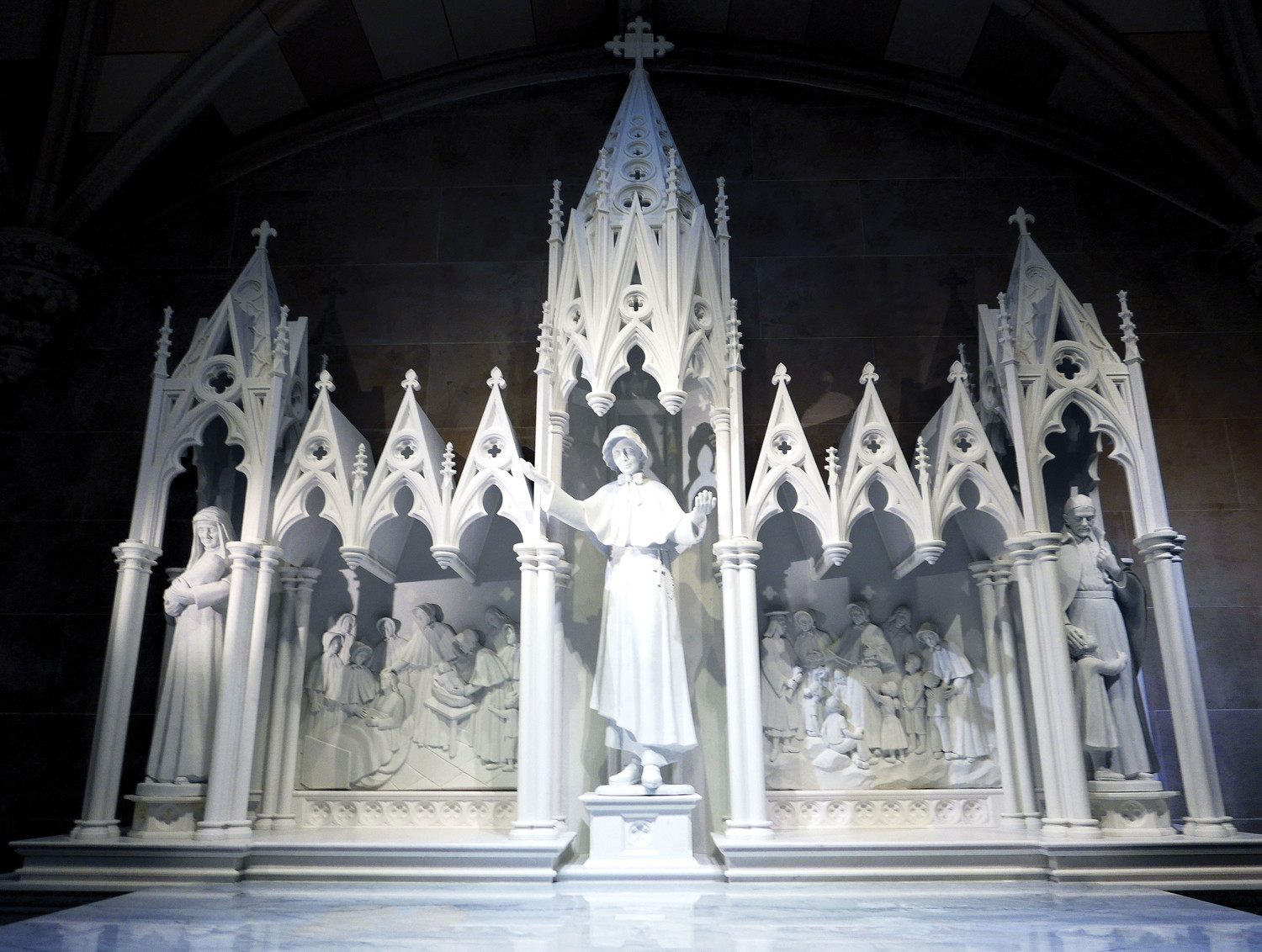 The 19th-century altar of the new St. Elizabeth Ann Seton Shrine inside St. Patrick's Cathedral was designed by the cathedral’s original architect, James Renwick Jr., and anchors the statuary and high relief panels of the late Sister Margaret “Peggie” Beaudette, S.C., a devoted teacher and renowned sculptor whose artwork for the shrine was her last commission before her death this past March 12. The shrine honors Mother Seton and the 200 years of service of the Sisters of Charity of New York which she founded.