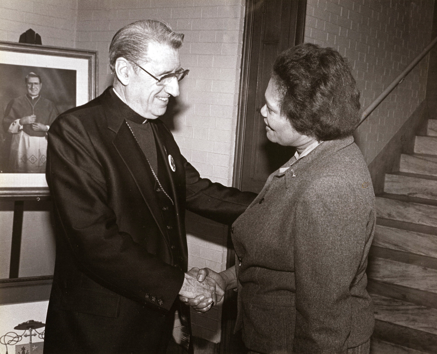 Cardinal John O’Connor greets Dolores B. Grier in 1984. The next year he appointed her vice chancellor for community relations in the archdiocese. Miss Grier died Feb. 22.