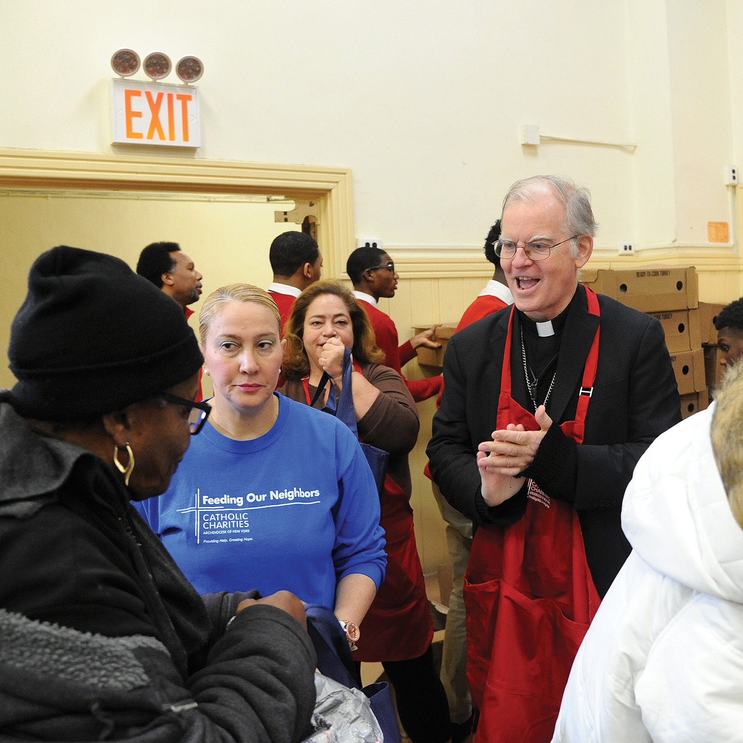 Auxiliary Bishop Peter Byrne led the distribution of 800 Thanksgiving turkeys to families in need two days before Thanksgiving Nov. 26 at the Lt. Joseph P. Kennedy Community Center in Harlem. (The bishop was substituting for Cardinal Dolan, who was offering a Funeral Mass for Alfred E. Smith IV at St. Patrick’s Cathedral.) Yams, potatoes and apples completed the full menu given out at the annual turkey distribution by Catholic Charities of New York.