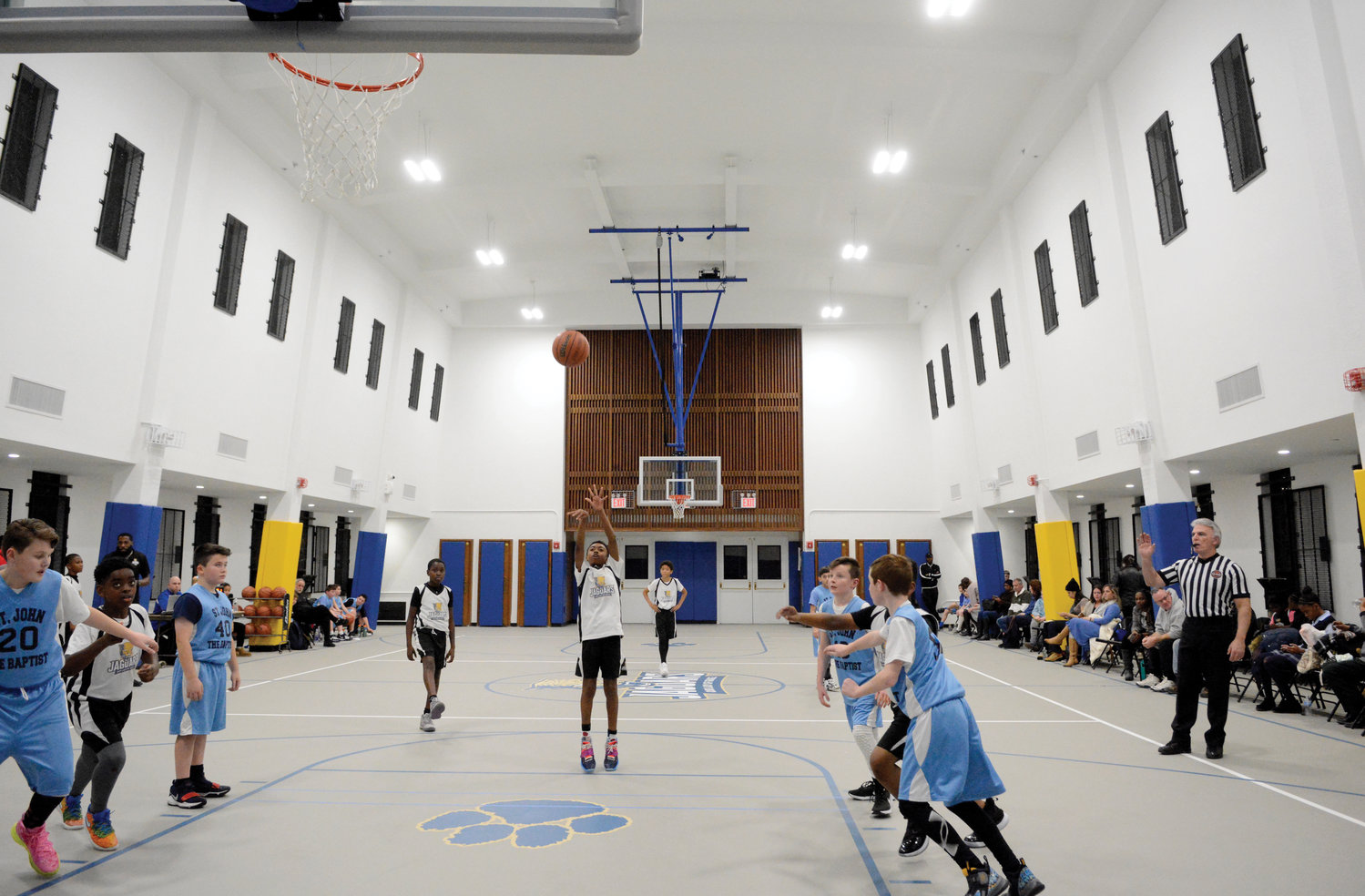 A wide view from one end of the new Our Lady of Grace School gymnasium as a free throw is taken during Our Lady of Grace’s game with St. John the Baptist of Yonkers in the Bronx Jan. 8.