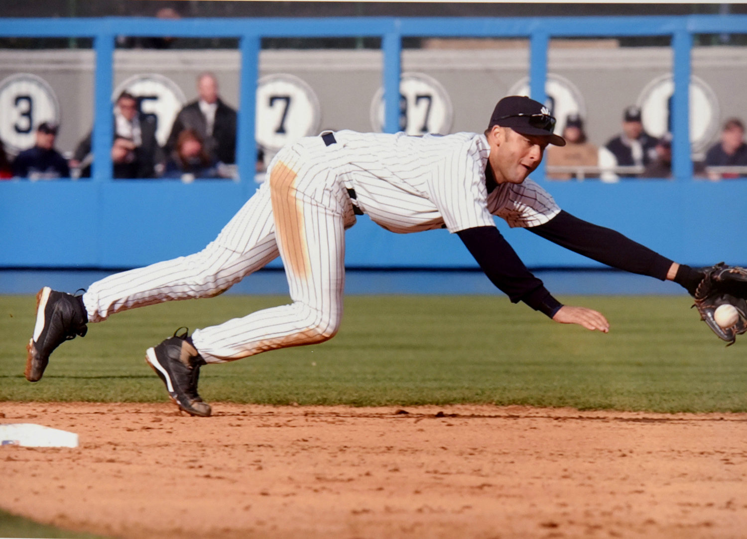 Shortstop Derek Jeter, shown diving for a ground ball, will be the second New York Yankee in as many years inducted in the Baseball Hall of Fame in Cooperstown July 26. Relief pitcher Mariano Rivera was inducted last year.