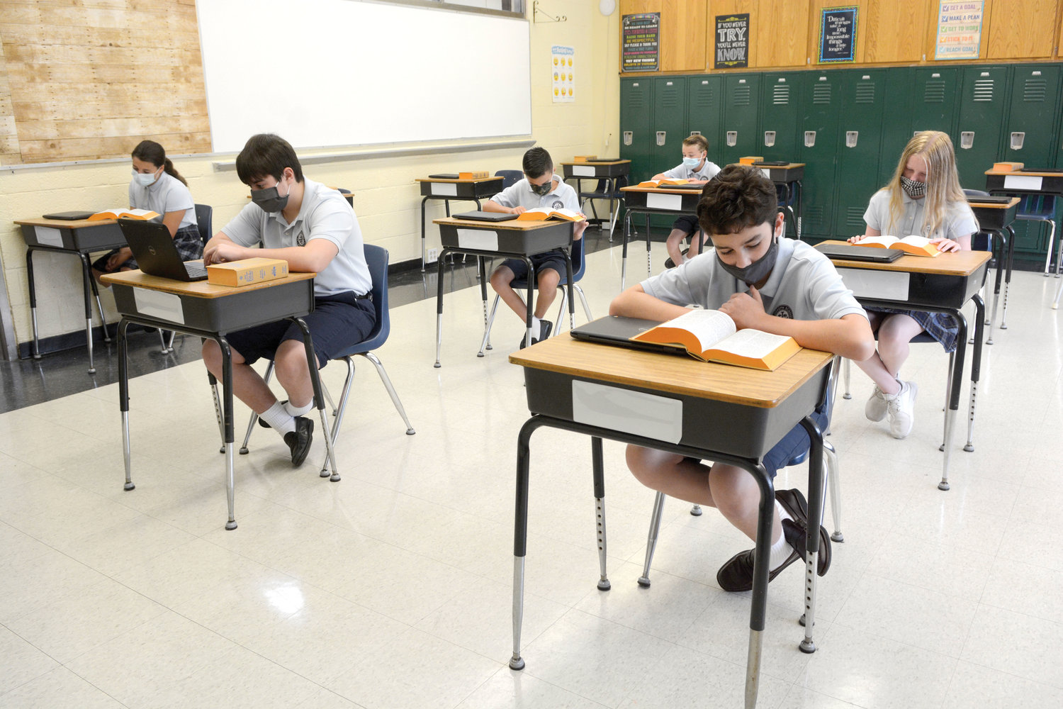 Some sixth-, seventh- and eighth-graders of St. Joseph School in Bronxville demonstrate Aug. 7 what a typical day inside a classroom will look like, with coronavirus protocols
in place.