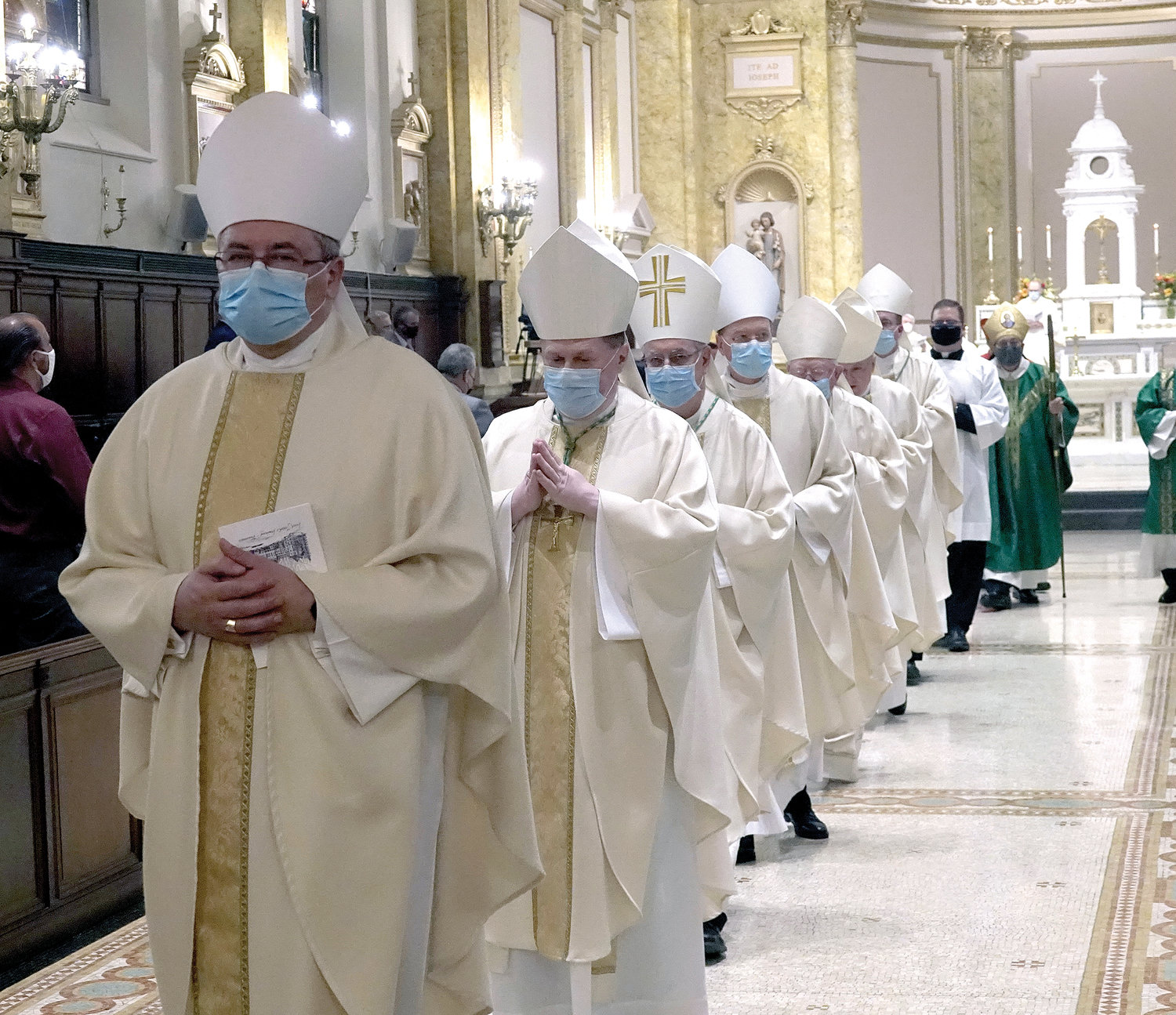 A line of bishops beginning with Auxiliary Bishop Witold Mroziewski of Brooklyn joins the recessional from the seminary chapel after the Mass. Nine prelates were on the altar, including Cardinal Dolan, who presided, and Bishop Nicholas DiMarzio of Brooklyn, the principal celebrant.