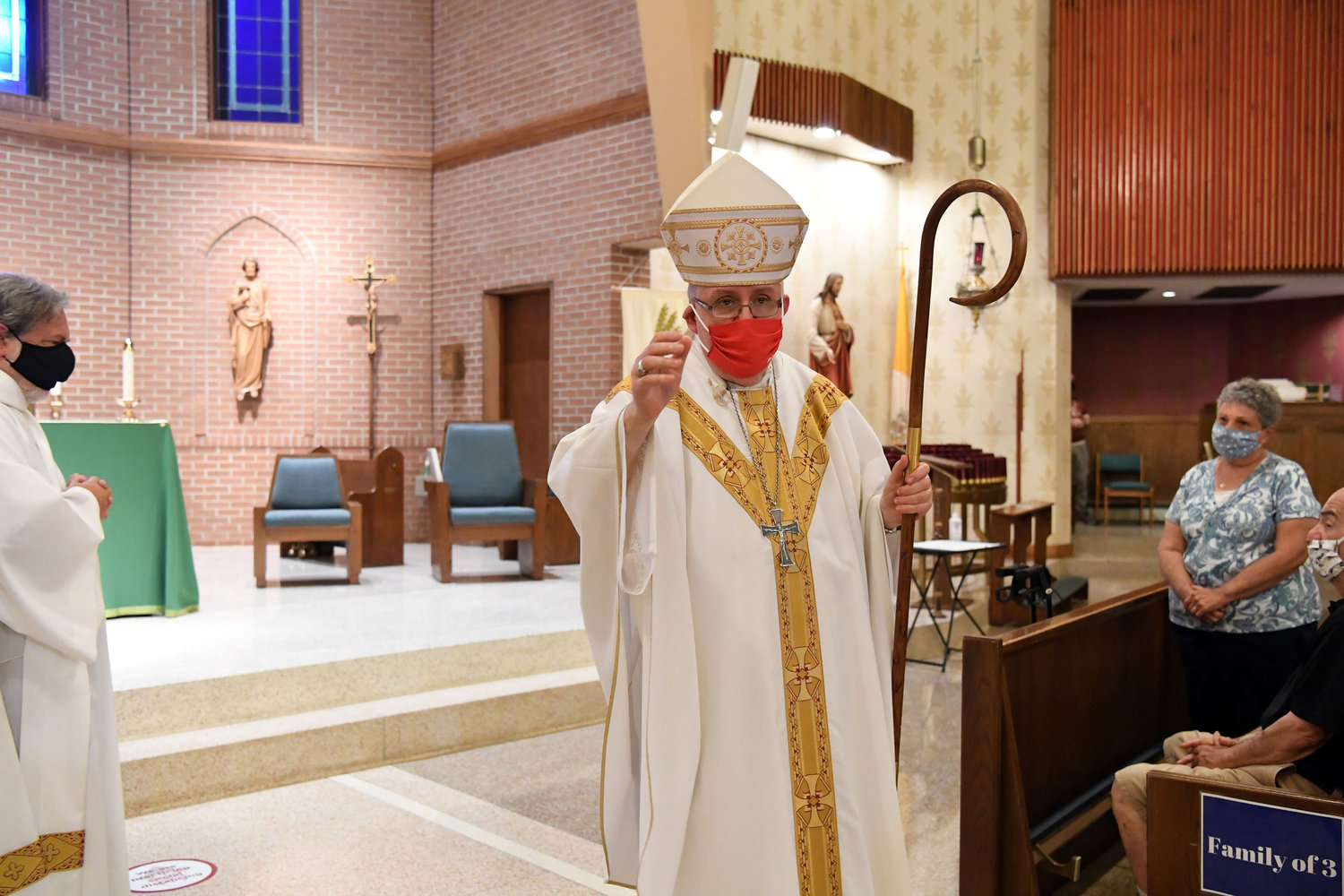 Bishop O’Hara gives a blessing at the end of Mass.