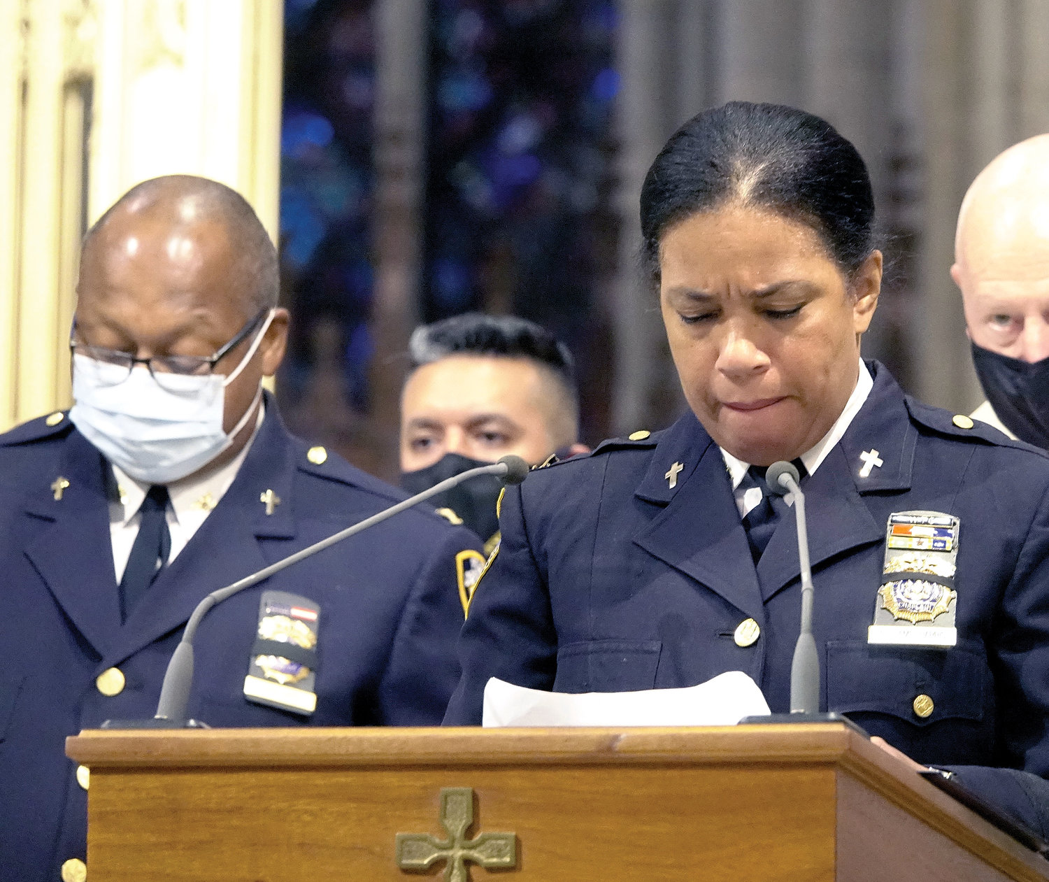 Several NYPD members led the Prayer of the Faithful, which included reading the names of the victims.