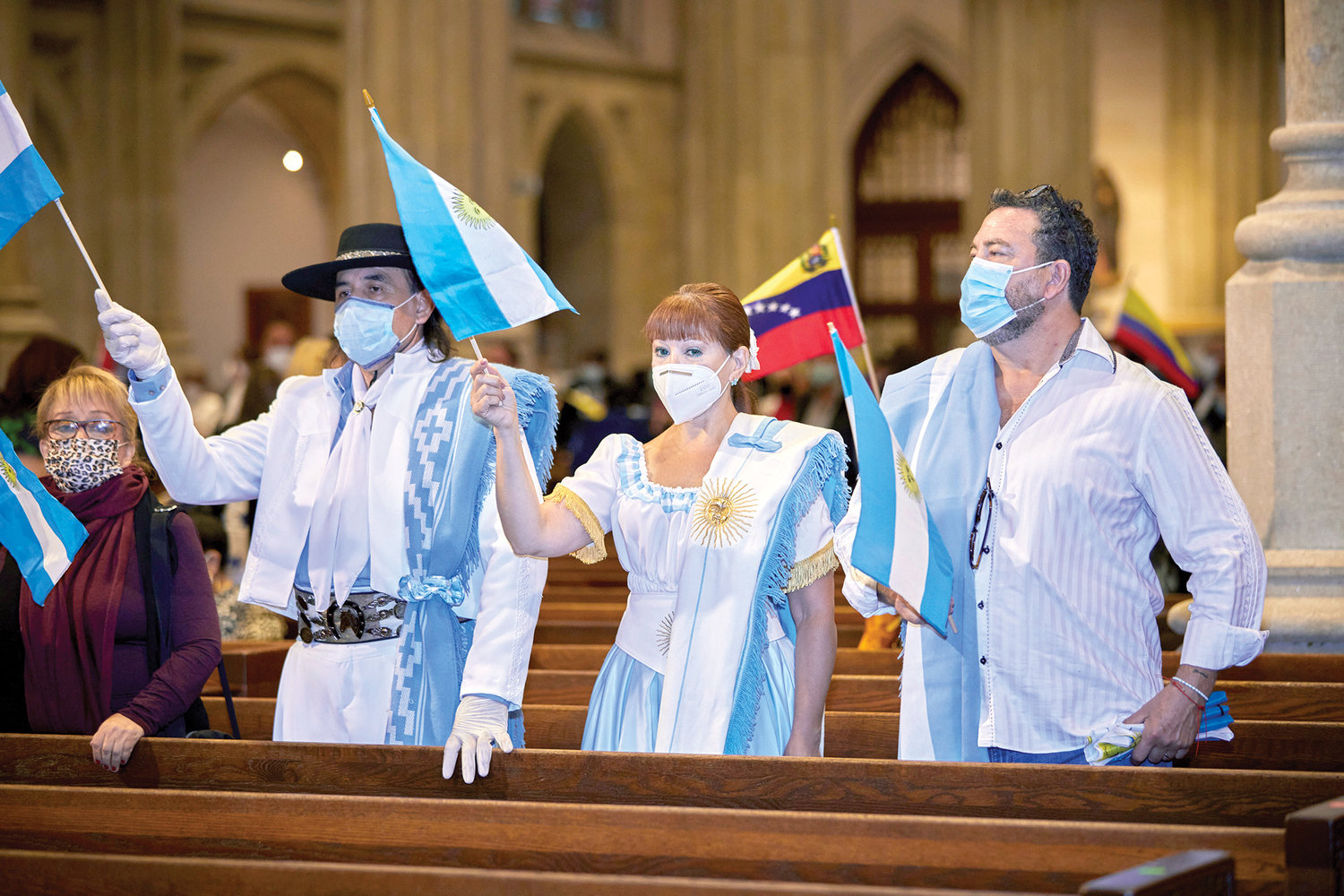 People are dressed in Argentinian folklore outfits. The Mass of All Nations is a Marian and cultural celebration focusing on the different ways that Mary is honored in Hispanic/Latino countries.
