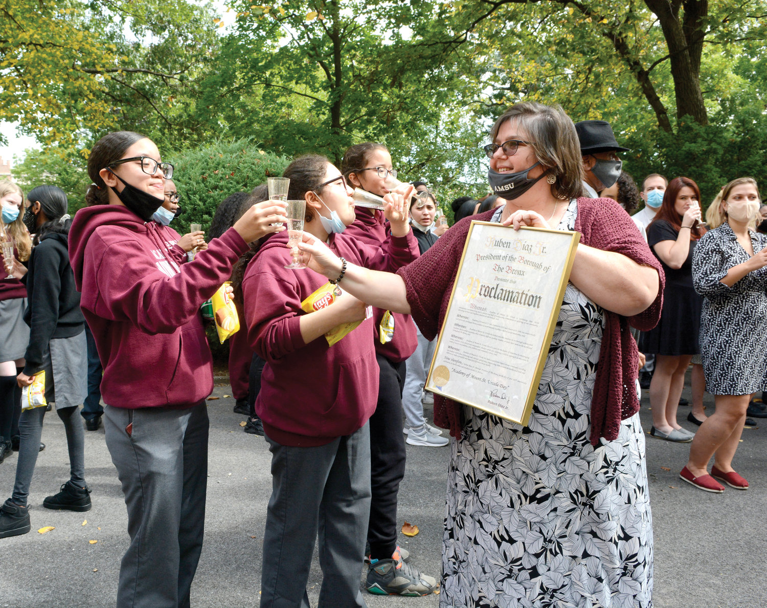 Sister Jean Marie Humphries, O.S.U., principal of Academy of Mount St. Ursula in the Bronx, marks the school’s 165th anniversary Oct. 1 by sharing a Sprite toast with student Ashley Veriguete. Sister Jean Marie holds a proclamation from the office of the Bronx borough president Ruben Diaz Jr. citing that day as Academy of Mount St. Ursula Day in the Bronx.