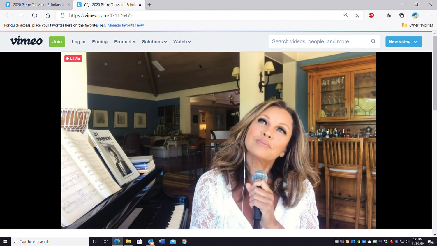 Recording artist Vanessa Williams performs from her home during the gala.