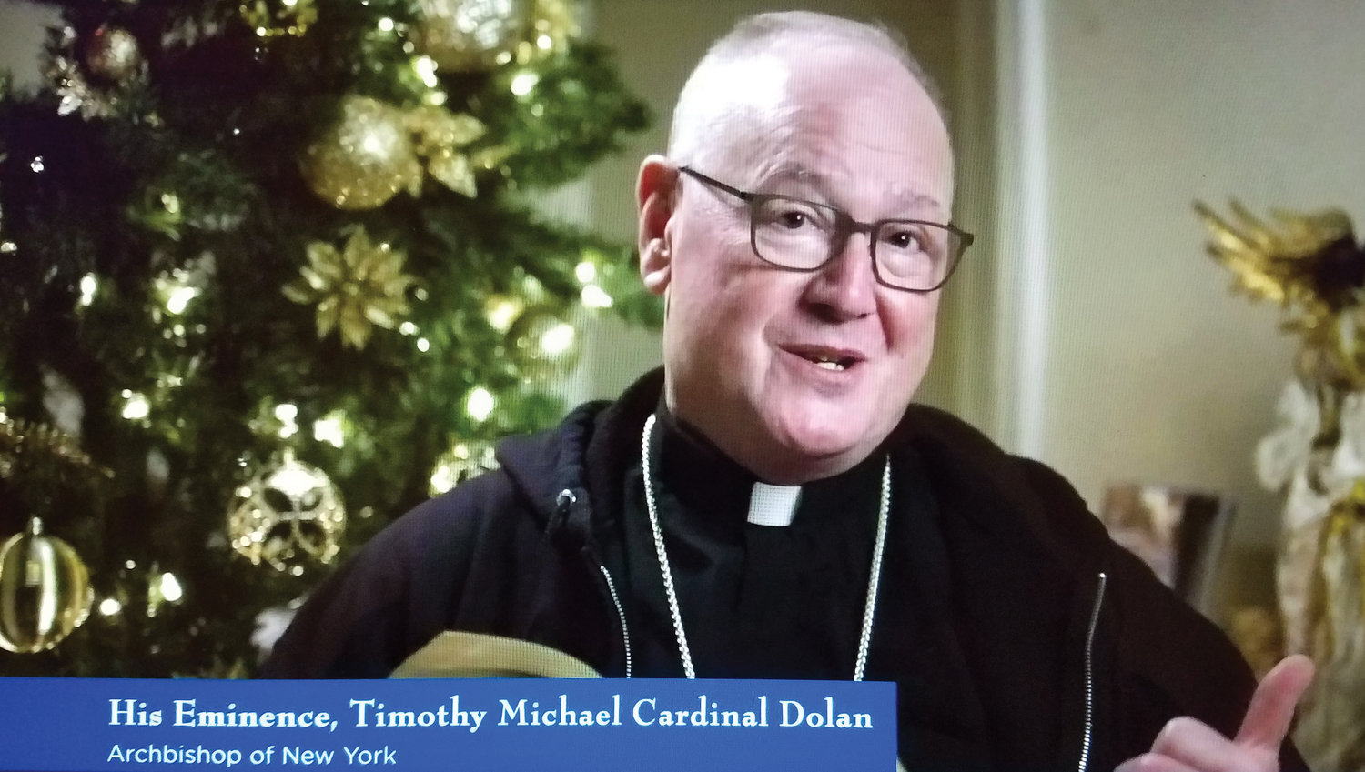 Cardinal Dolan proclaims the Infancy narrative, the birth of Jesus, from the second chapter of the Gospel of St. Luke.