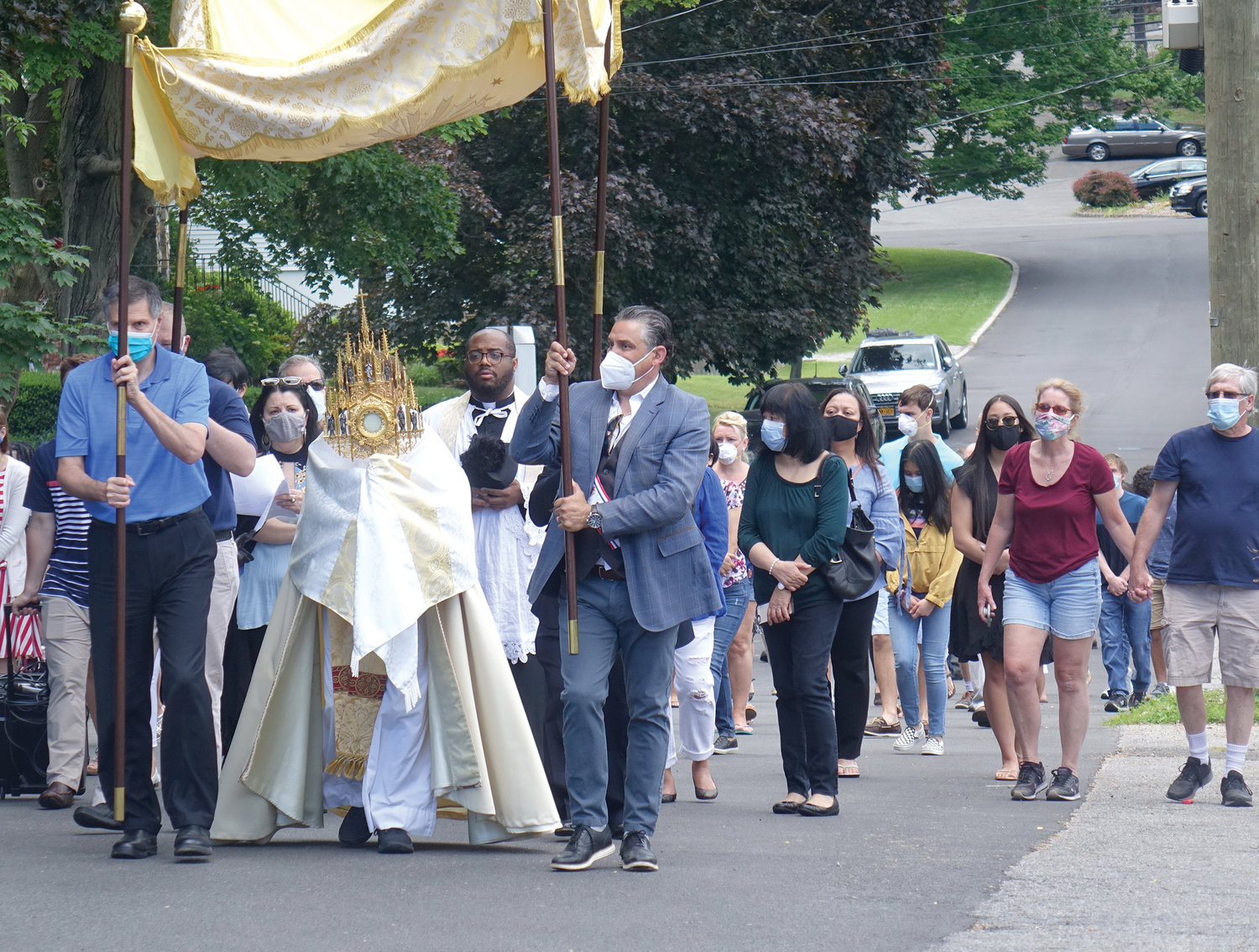 Parishioners of Annunciation-Our Lady of Fatima in Crestwood celebrated the reopening of their church and the Solemnity of the Most Holy Body and Blood of Christ with a Eucharistic procession June 14.