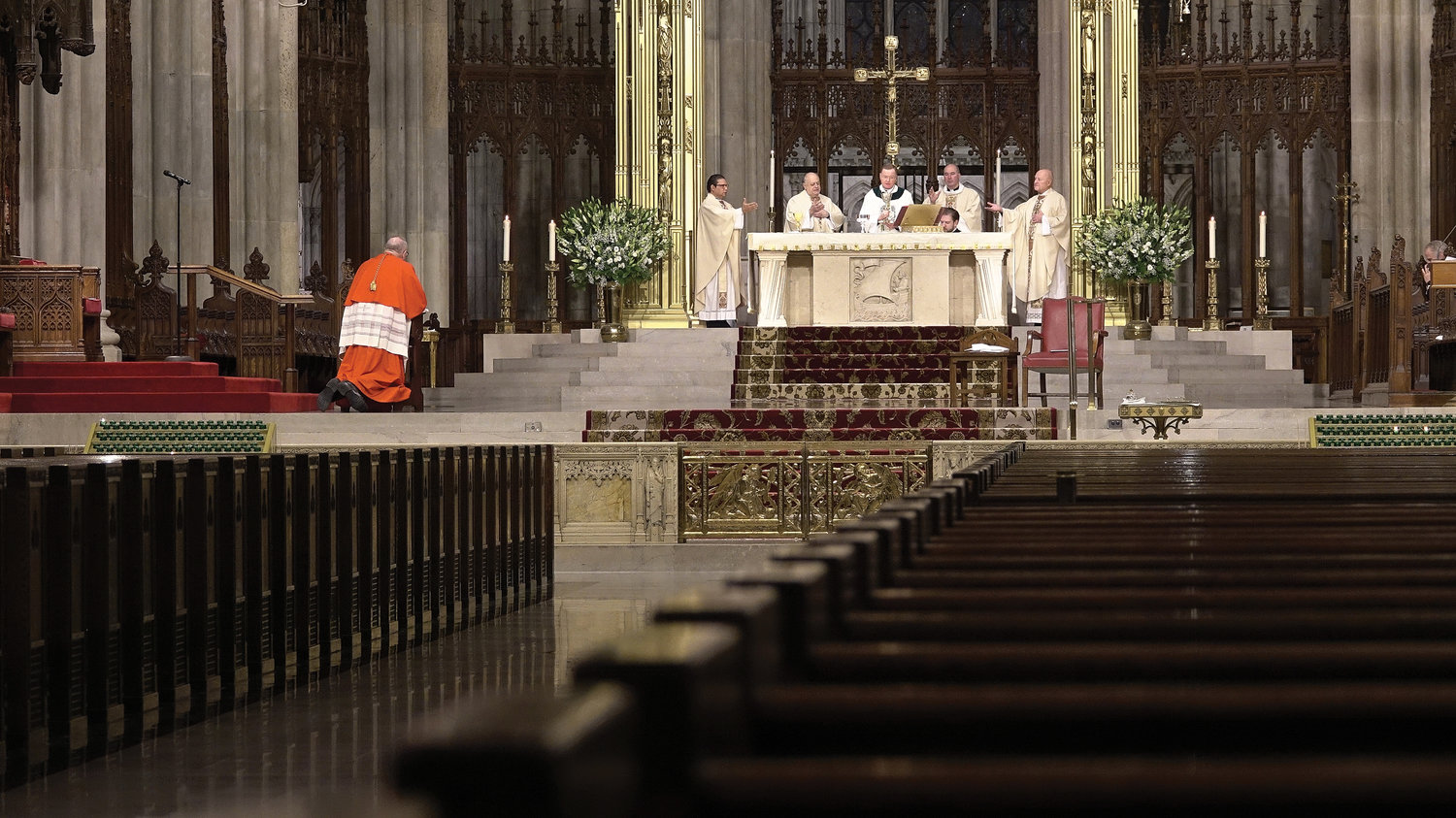 Except for clergy on the altar, St. Patrick’s Cathedral was empty during the 2020 St. Patrick’s Day Mass, which was offered as the Covid-19 pandemic was unfolding in New York. Cardinal Dolan will serve as celebrant for this year’s St. Patrick’s Day Mass at the cathedral Wednesday, March 17.