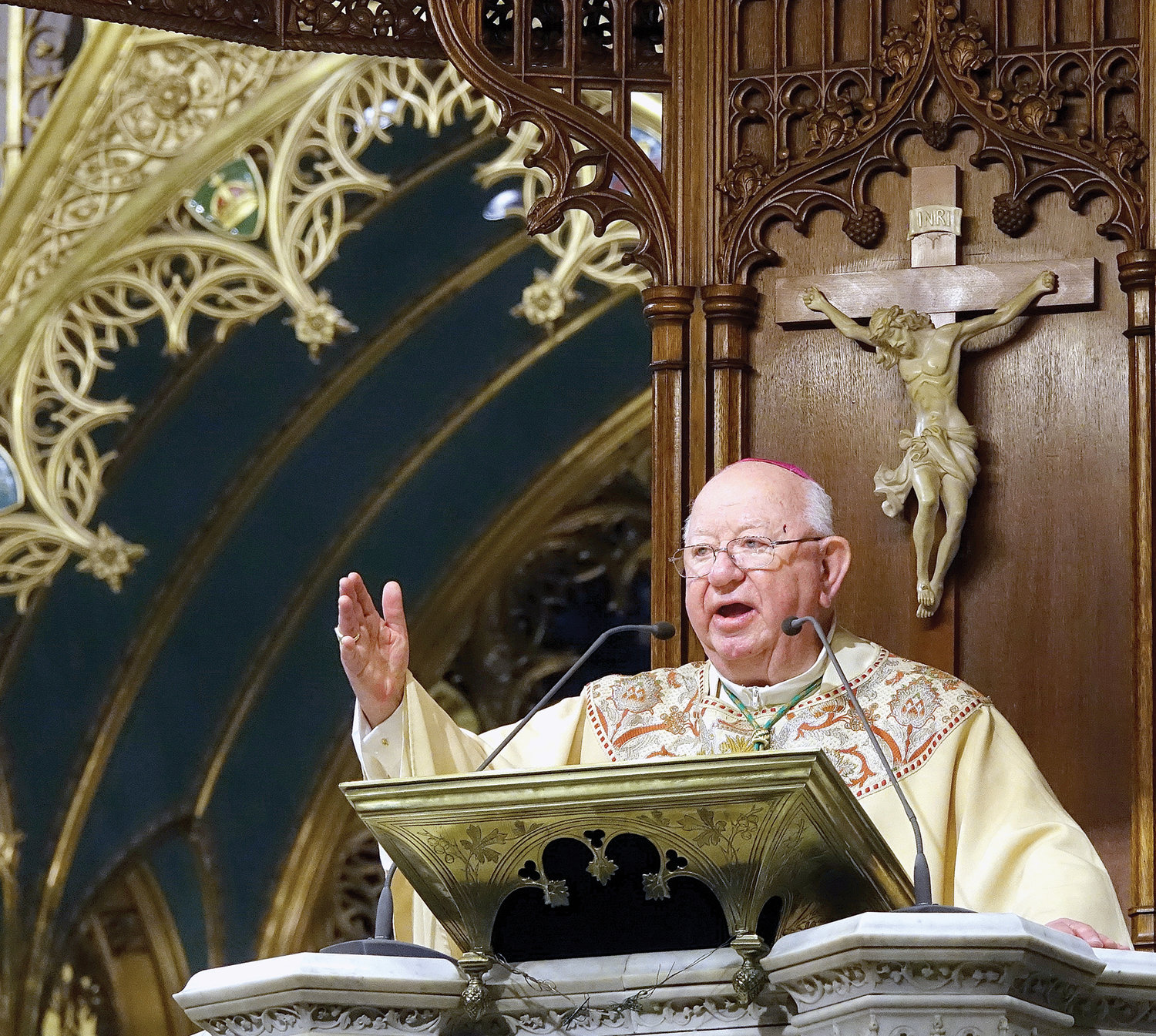 Bishop Emeritus William Murphy of Rockville Centre preaches during the St. Patrick’s Day Mass at St. Patrick’s Cathedral March 17. In an early 20th anniversary tribute to those who were killed during the 9/11 attacks, the bishop remarked that his Long Island diocese lost 400 parishioners that day.