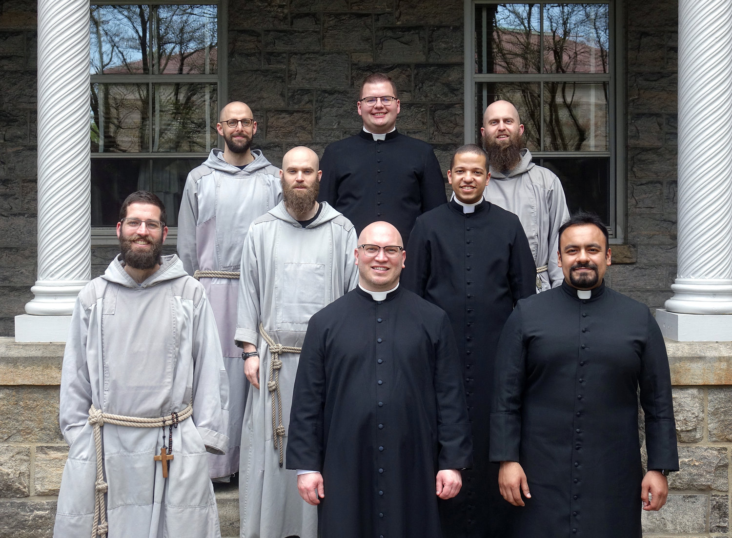 Eight members of the Class of 2021 at St. Joseph’s Seminary pose on the Dunwoodie campus. From left, they are Father Frantisek Marie Chloupek, C.F.R., Father Ignatius Pio Mariae Doherty, C.F.R., Father Joseph Michael Fino, C.F.R., Father Robert Carolan, Father Kevin Panameño , Father Elijah Marie Perri, C.F.R., Father Steven N. Gonzalez and Father Matthew Breslin. All eight, plus Father Carmine Caruso and Father Wesbee Victor, will be ordained to the priesthood by Cardinal Dolan at St. Patrick’s Cathedral Saturday, May 29.