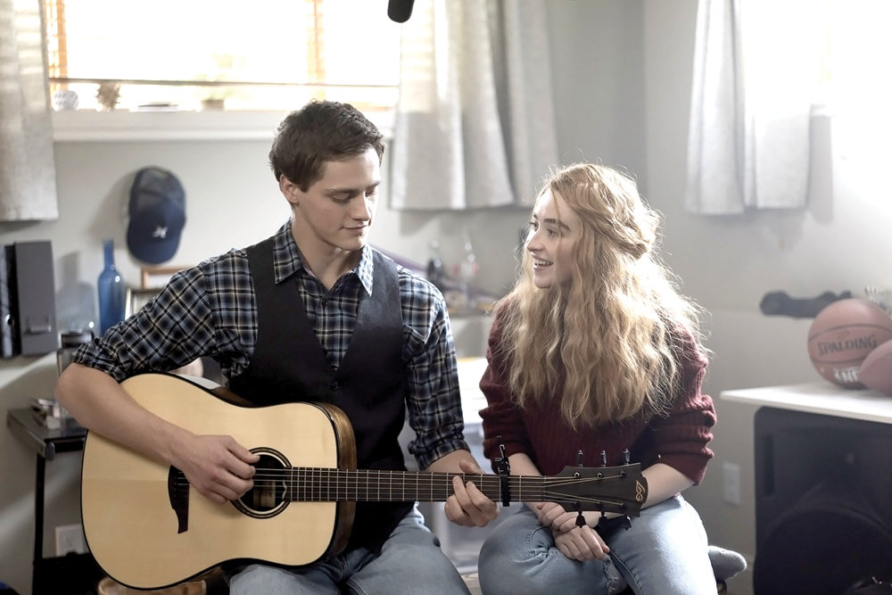 INSPIRING—Fin Argus and Sabrina Carpenter in a musical scene from “Clouds.” In the film, a teenager diagnosed with a rare form of bone cancer is inspired to help others with the little time he has left to live.