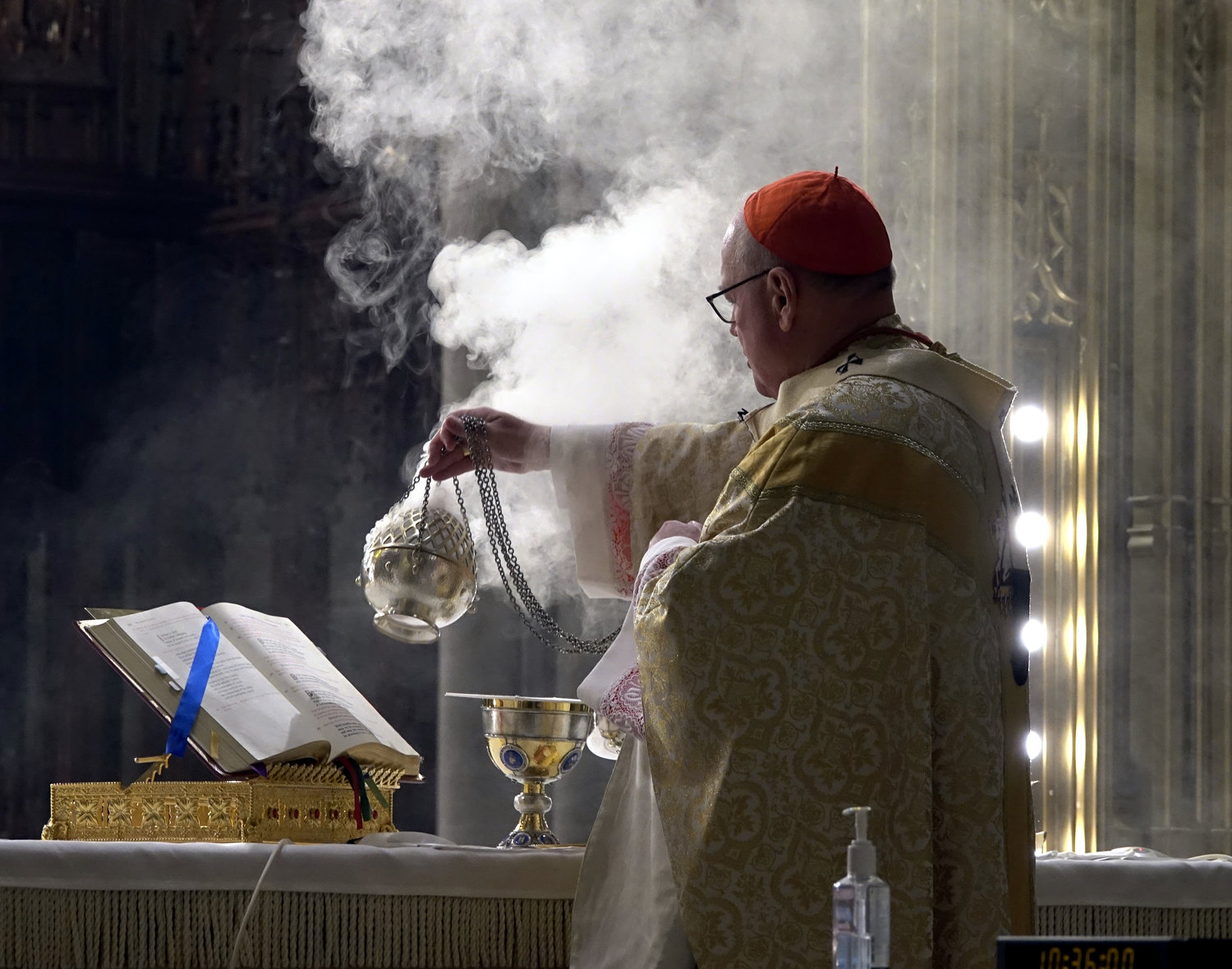 EASTER MASS—Cardinal Dolan incenses the altar at St. Patrick’s Cathedral on Easter Sunday, April 12, 2020. This photo won first-place honors in the annual Catholic Press Awards competition. Story on page 9.