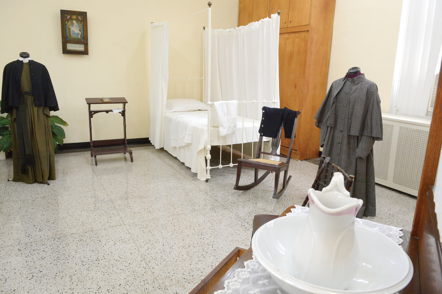 Two exhibits at the St. Frances Xavier Cabrini Shrine in Washington Heights feature Mother Cabrini’s personal clothing and items. The exhibits, which opened July 7, were created as a way to commemorate the 75th anniversary of the canonization of Mother Cabrini, which occurred July 7, 1946. They include Mother Cabrini’s bed and a New York Times story clipping about the canonization.