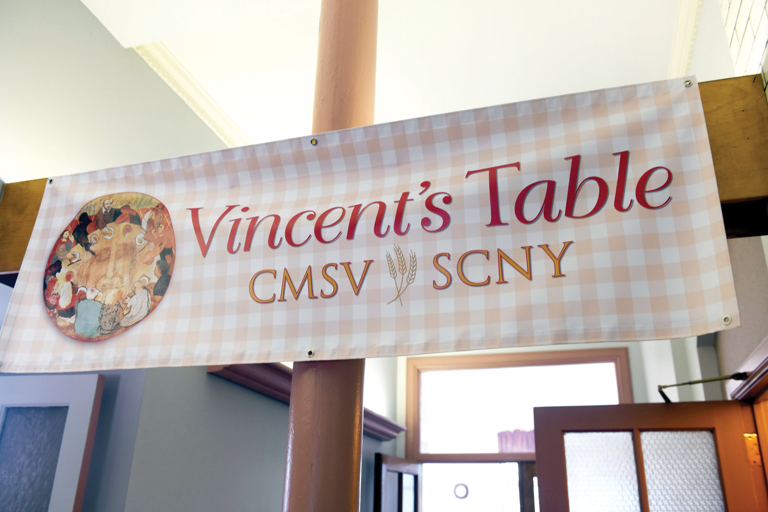 A sign welcomes visitors to Vincent’s Table.