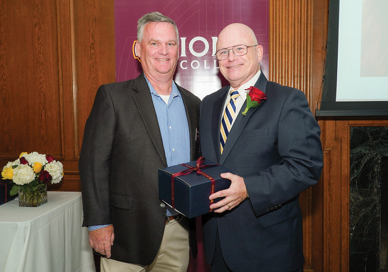 DISTINGUISHED LEADER—Michael Deegan, superintendent of schools for the archdiocese, right, is pictured alongside Michael J. LaPerch Sr., president of Iona College Alumni Board of Directors in New Rochelle. Deegan was honored in October by Iona College as a recipient of the Brother Arthur A. Loftus Award for Outstanding Achievement. The award “recognizes and honors Ionians who have brought acclaim to the College by brilliant accomplishments in their chosen careers.” Dating to 1965, the award perpetuates the memory of Iona’s second president, Brother Loftus, who was also on the original faculty of the college. Deegan, a 1975 alumnus of Iona, was one of four recipients of the Loftus Award, which was conferred during the college’s Homecoming and Reunion weekend. Deegan said he accepted the award on behalf of school leaders and pastors of the archdiocese.