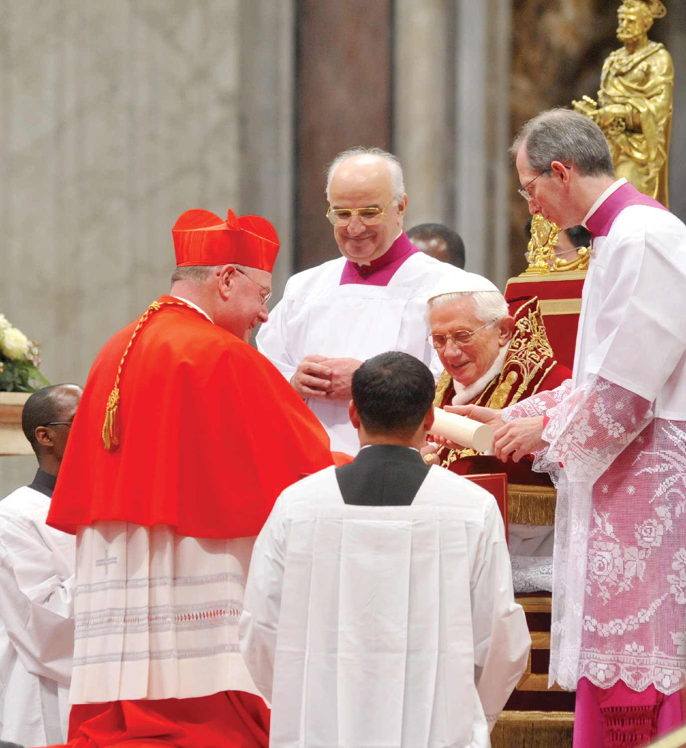 Pope Benedict XVI and Cardinal Timothy M. Dolan beam during consistory in St. Peter’s Basilica Feb. 18, 2012 in which the Archbishop of New York and 21 other churchmen from around the world became members of the College of Cardinals.