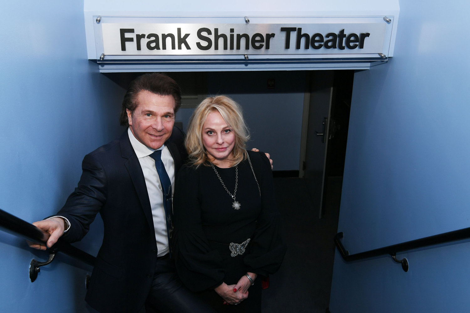 NAMESAKE—Frank and Suzanne Shiner find the right spot leading to the Frank Shiner Theater before Cardinal Dolan blessed the former Black Box Theater Feb. 28 at the Sheen Center for Thought and Culture in lower Manhattan.