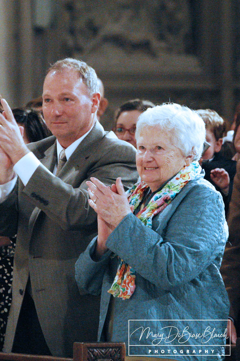 Shirley Dolan joins her son Bob in applause at Vespers in St. Patrick's Cathedral April 14, 2009 during installation ceremonies for her son, then-Archbishop Timothy M. Dolan, as Archbishop of New York.