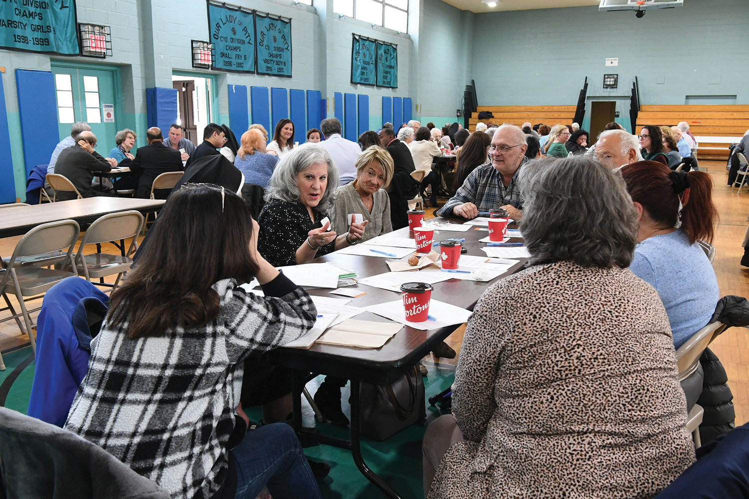 Attendees break into groups to discuss the Church’s “doing well” programs and activities, as well as “could do better” efforts.