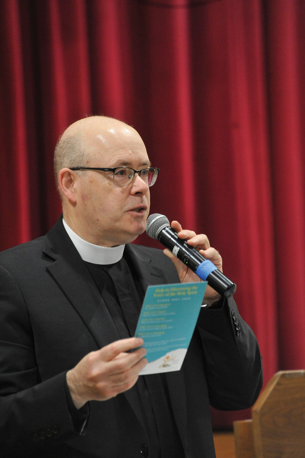 Father Joseph McLafferty, pastor of St. Kateri Tekakwitha in LaGrangeville and dean of Dutchess/Putnam counties, speaks to the participants in the listening session at St. Denis-St. Columba School in Hopewell Junction March 19.