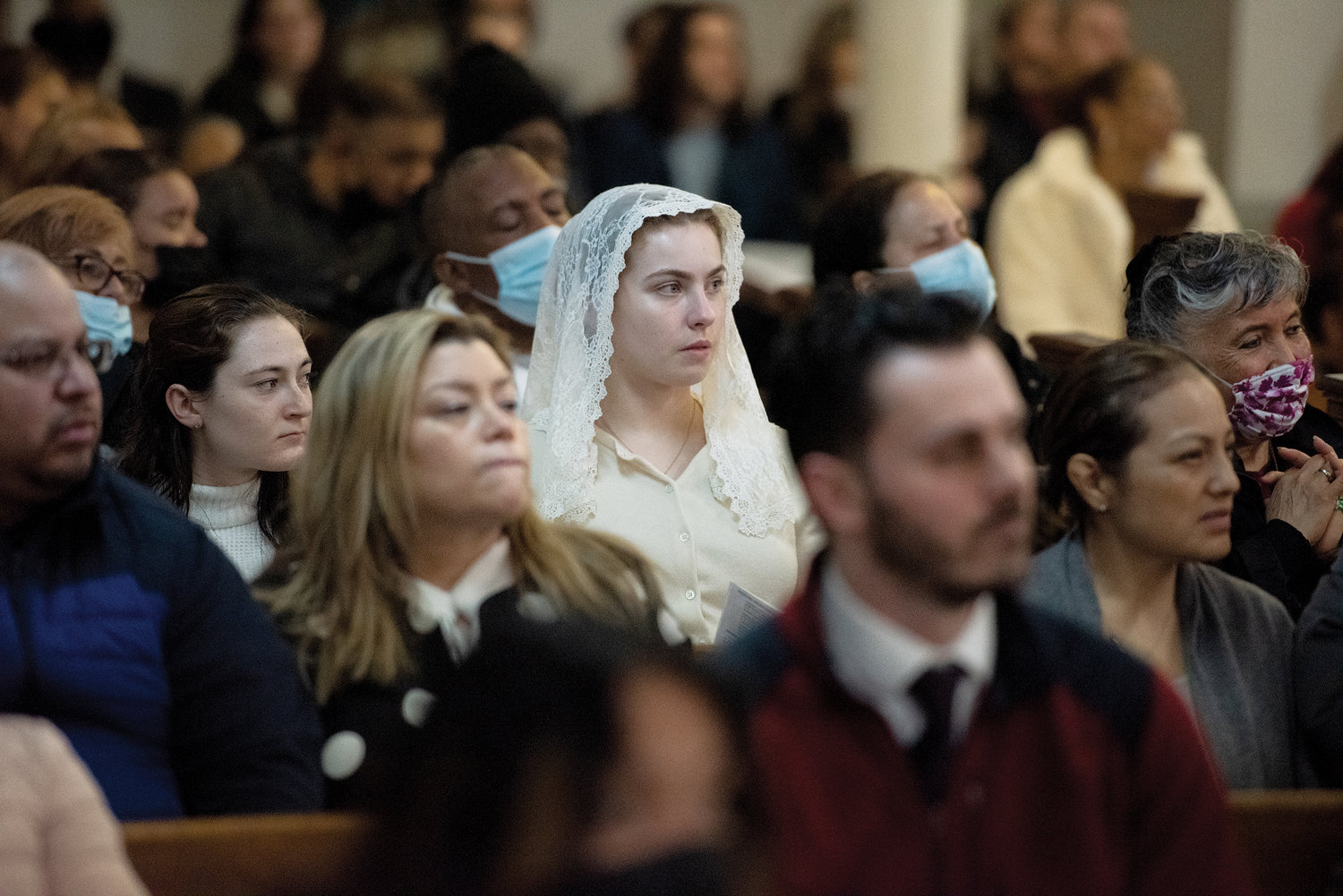 The faithful pray during the April 7 Mass in honor of Blessed Carlo Acutis at St. Rita of Cascia Church in the Bronx. The evening included a Holy Hour and veneration of a first-class relic of Blessed Carlo.