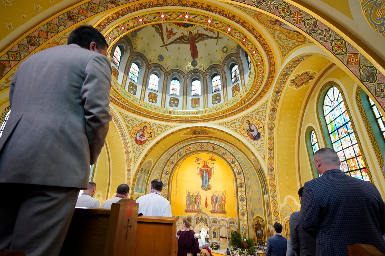 Worshippers attend an Easter Divine Liturgy April 24 at St. George Ukrainian Catholic Church in Manhattan’s East Village.