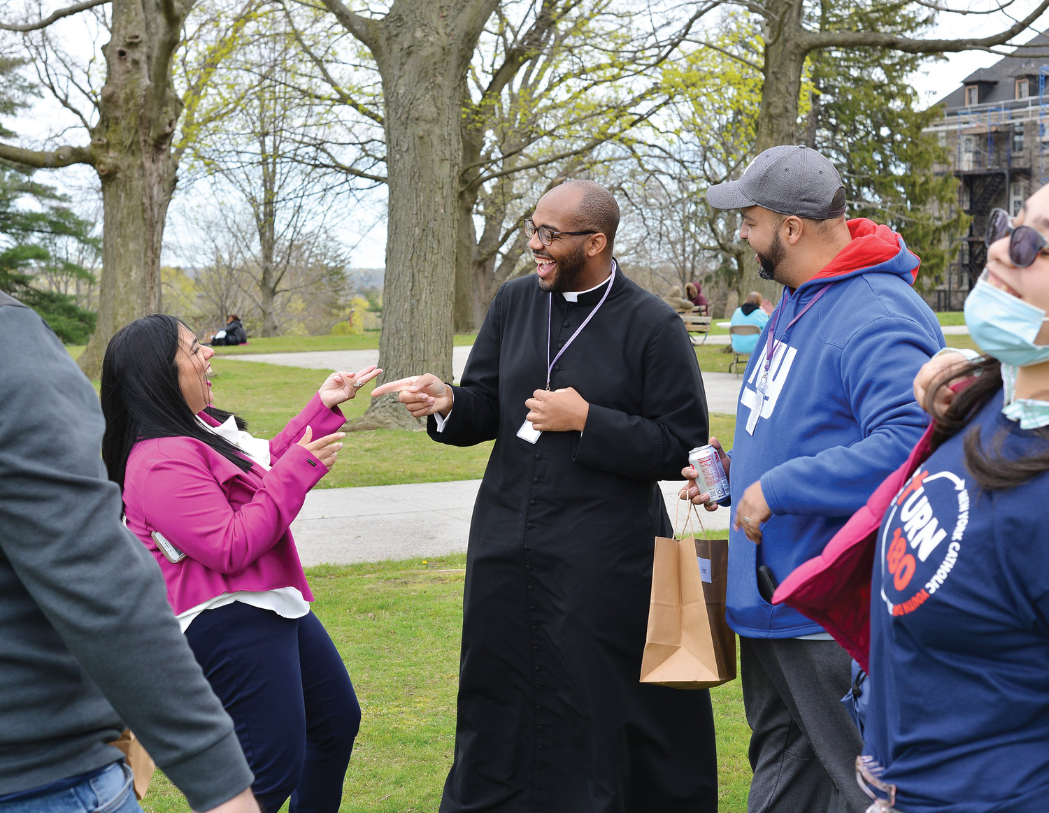 Father Kareem Smith, parochial vicar of St. Elizabeth Ann Seton parish in Shrub Oak, joins in conversation during New York Catholic Youth Day at St. Joseph’s Seminary, Dunwoodie, April 23.
