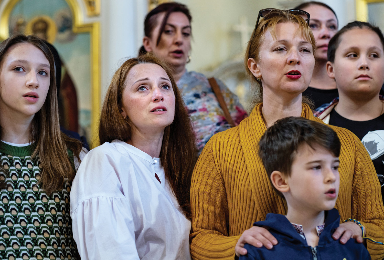 Ukrainian refugees in Slovakia sing during a special service at the Eparchy of Košice Greek Catholic Church April 30.
