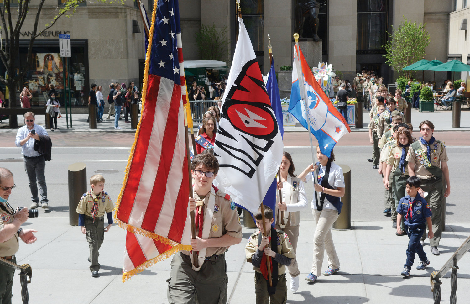 Boy Scouts and Girl Scouts from around the archdiocese march across Fifth Avenue into St. Patrick’s Cathedral for the Emblem Sunday Scouting Mass May 1.