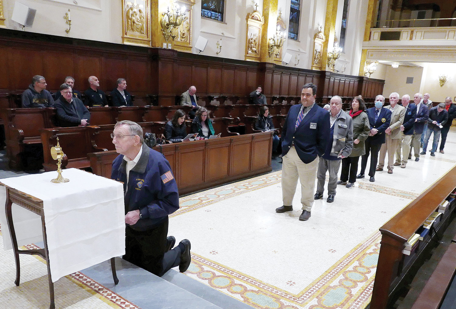 People line up in the seminary chapel to venerate a first-class relic of Blessed McGivney, who was beatified in October 2020.