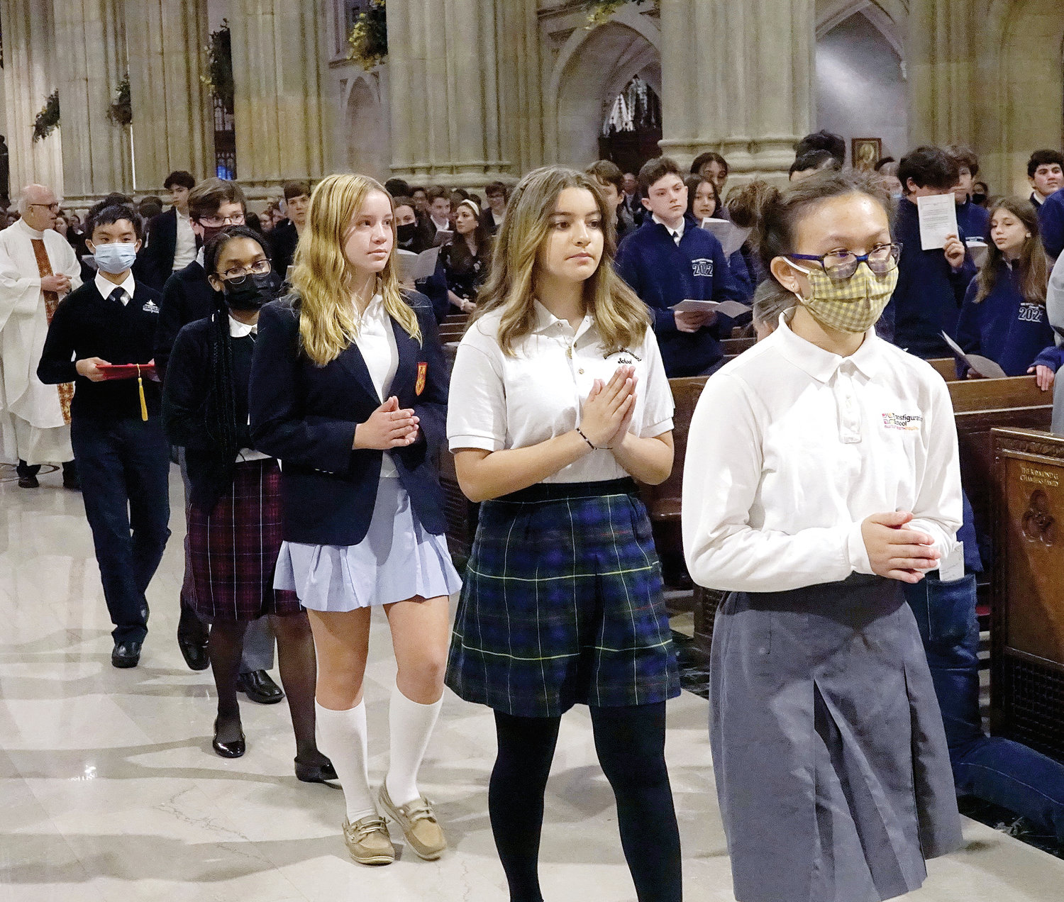 Students lead the opening procession May 6 at the Eighth-Grade Graduation Mass for Manhattan Region Catholic Schools in St. Patrick’s Cathedral.