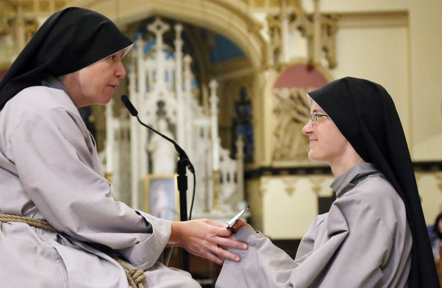 Mother Clare Matthiass, C.F.R., general servant of the Franciscan Sisters of the Renewal, receives the final vows of Sister Josephine Marie of Mercy, C.F.R., at Our Lady of Good Counsel Church in Manhattan.
