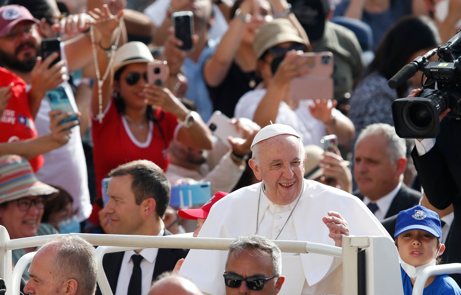 Pope Francis greets the crowd during his general audience in St. Peter’s Square at the Vatican June 22.