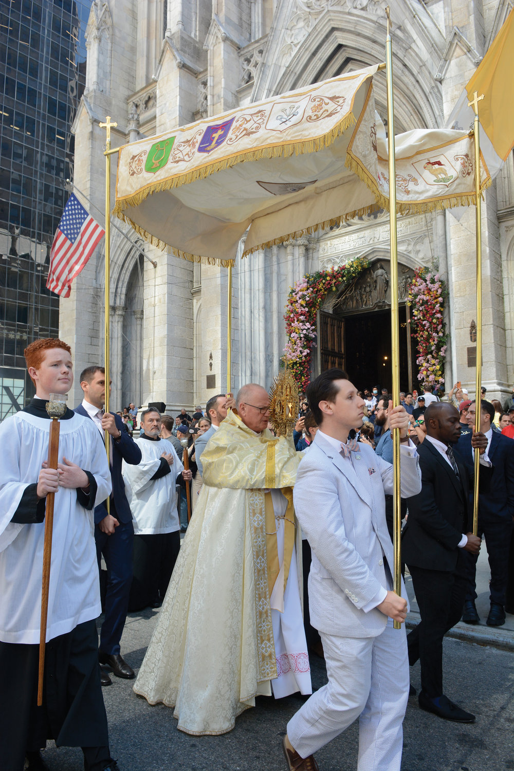 Cardinal Dolan, center, presides at the Corpus Christi procession outside St. Patrick’s Cathedral June 19, the Solemnity of the Most Holy Body and Blood of Christ, following the 10:15 a.m. Mass he celebrated inside the cathedral.