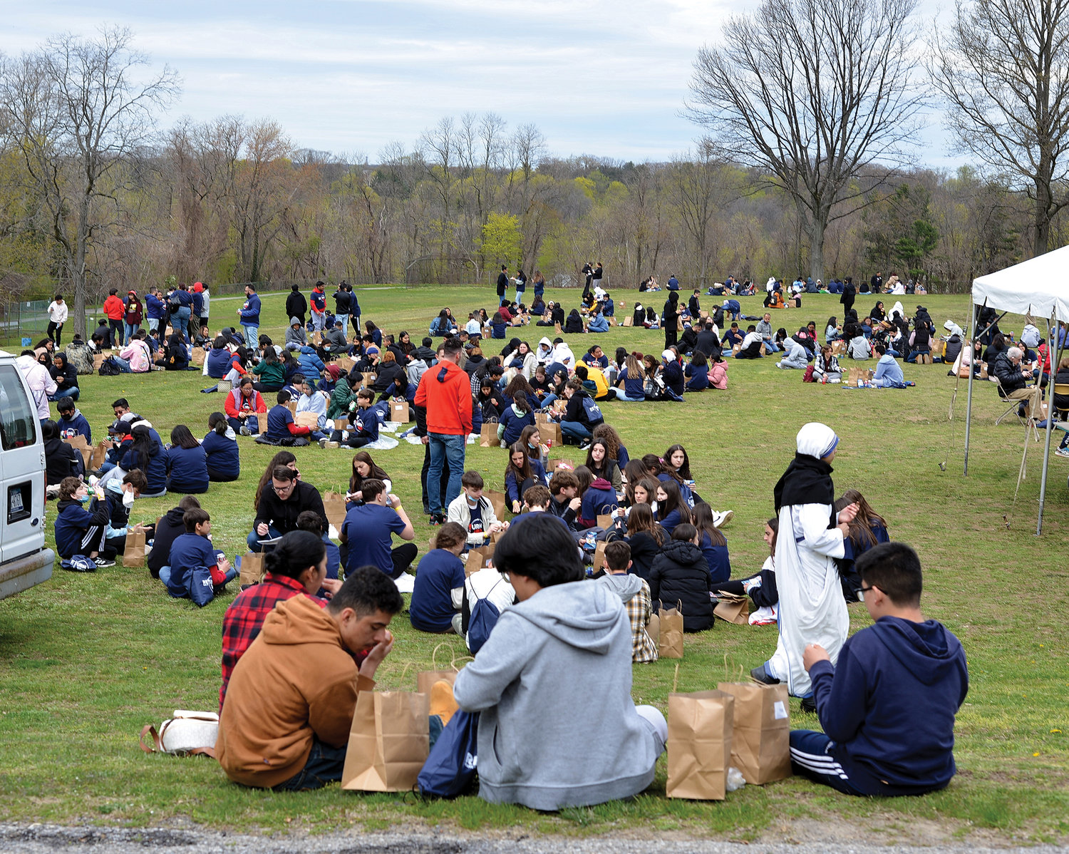 Teens gather outside for lunch during New York Catholic Youth Day at St. Joseph's Seminary, Dunwoodie. About 700 young people attended the daylong event April 23.