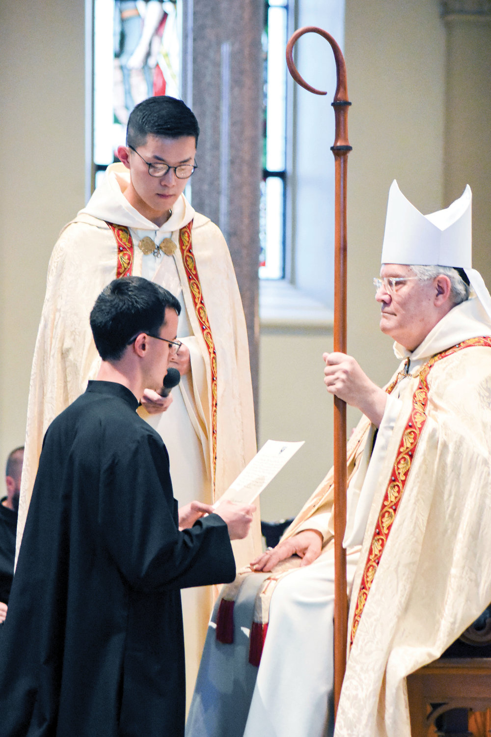 Brother Bede Maxson, O.S.B., professes first, or simple, vows before Archabbot Martin de Porres Bartel, O.S.B., at St. Vincent Archabbey in Latrobe, Pa., July 10.