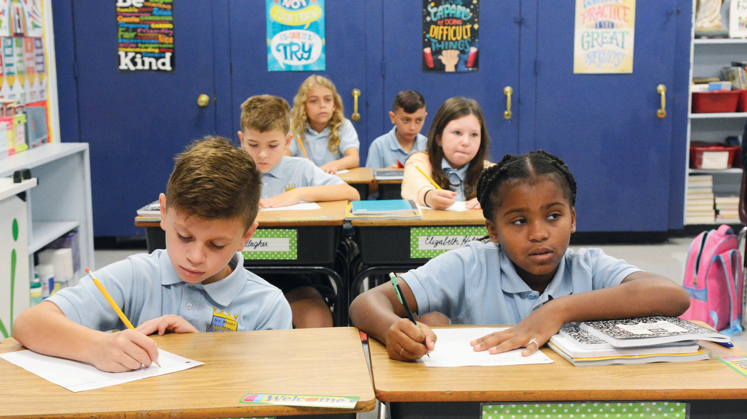 Students got right back to learning Sept. 6, the first day of classes at St. Mary’s School in Fishkill. Fourth-graders quickly put their pencils to paper.