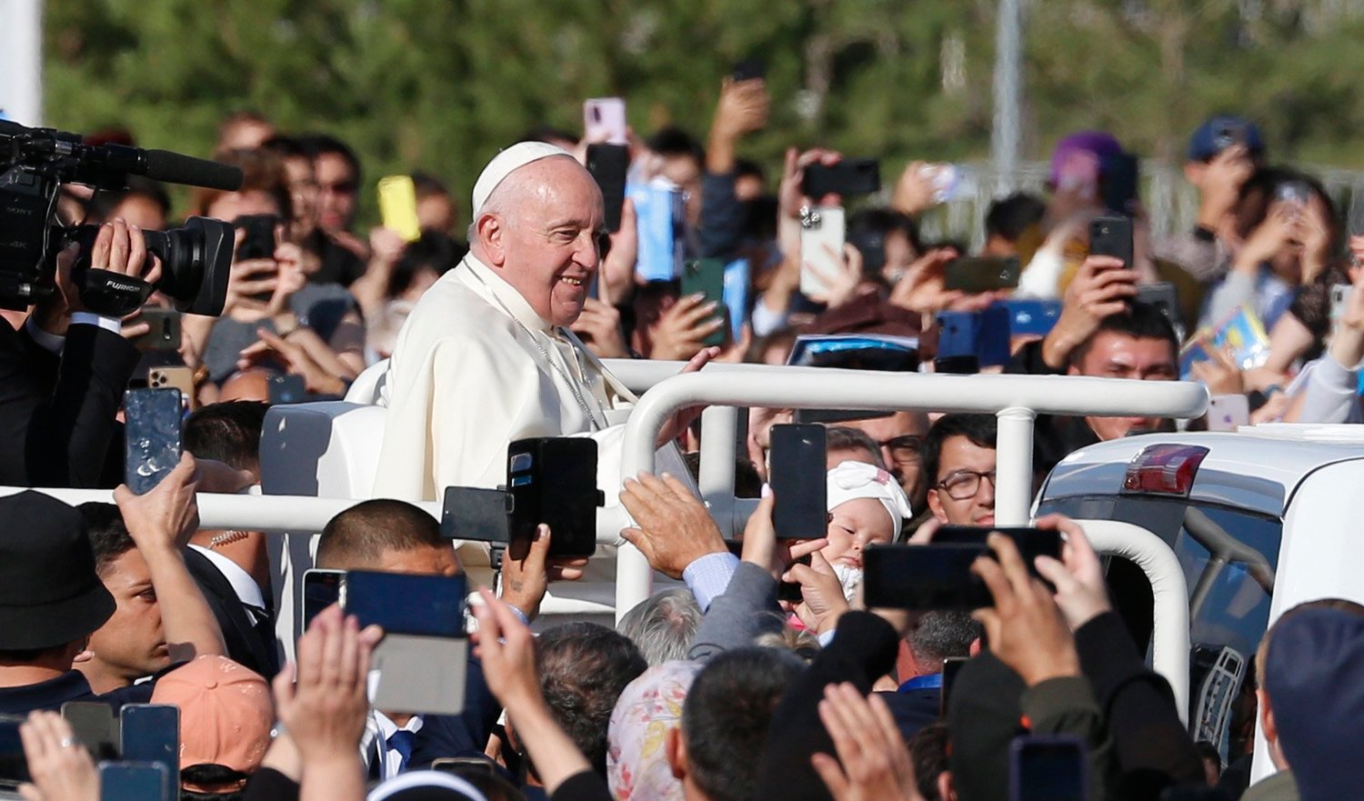 Pope Francis greets the crowd before celebrating Mass at the Expo grounds in Nur-Sultan, Kazakhstan, Sept. 14.