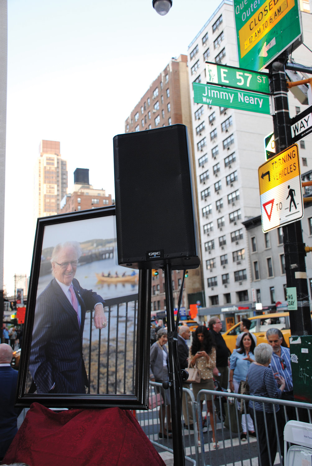 An image of Jimmy Neary overlooks the busy corner, a block from the New York Catholic Center.